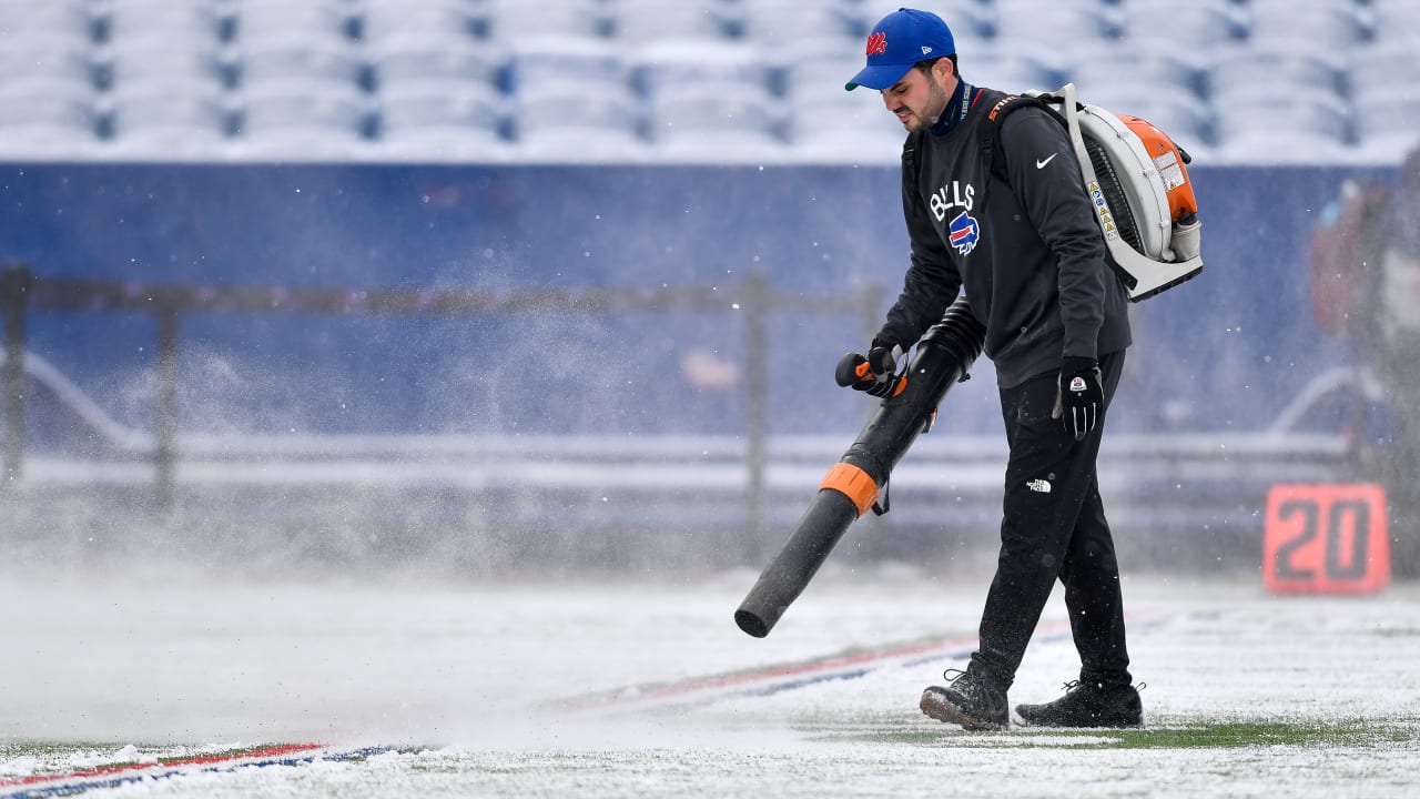 NFL Network reporter Cameron Wolfe stands on the field before an NFL  football game between the Cincinnati Bengals and the Cleveland Browns,  Sunday, Sept. 10, 2023, in Cleveland. The Browns won 24-3. (