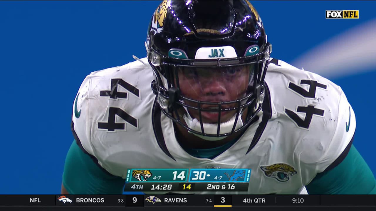 Detroit Lions quarterback Jared Goff dots wide receiver D.J. Chark near