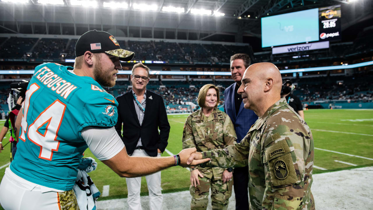 Miami Dolphins fans show their support outside of the stadium