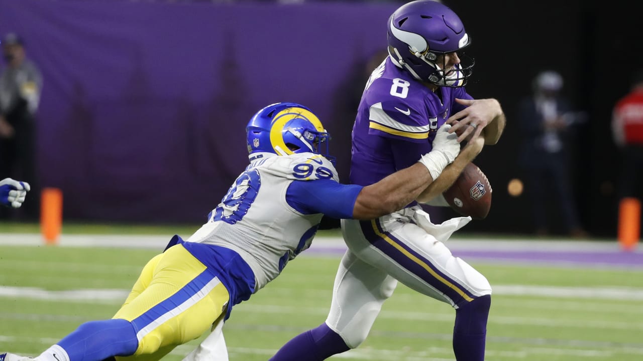 Los Angeles Rams defensive tackle Aaron Donald fights double team en route  to strip-sack