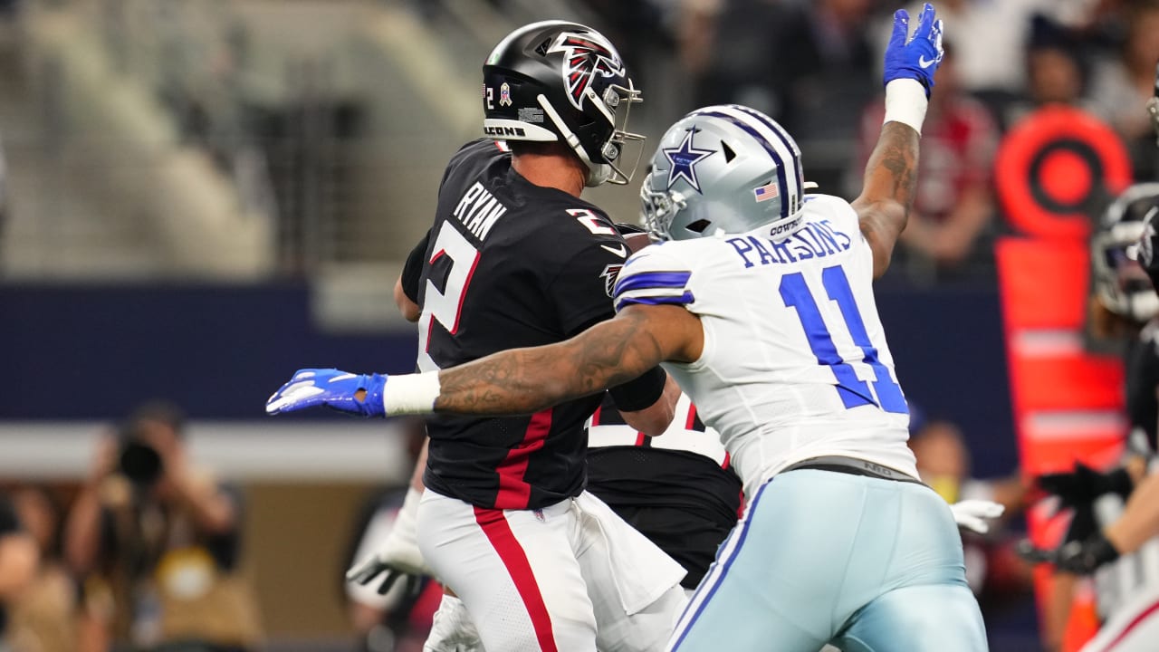 Dallas Cowboys outside linebacker Micah Parsons storms through two New York Giants offensive linemen for his first sack of the 2023 NFL regular season