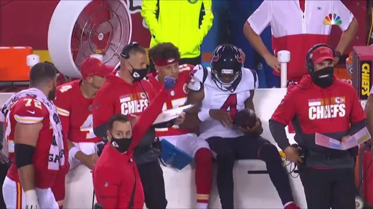 Houston Texans quarterback Deshaun Watson takes a seat next to Kansas