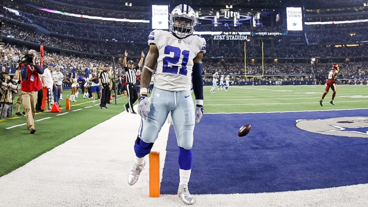 Dallas Cowboys quarterback Dak Prescott hits a wide-open Cowboys running  back Ezekiel Elliott for a walk-in touchdown pass