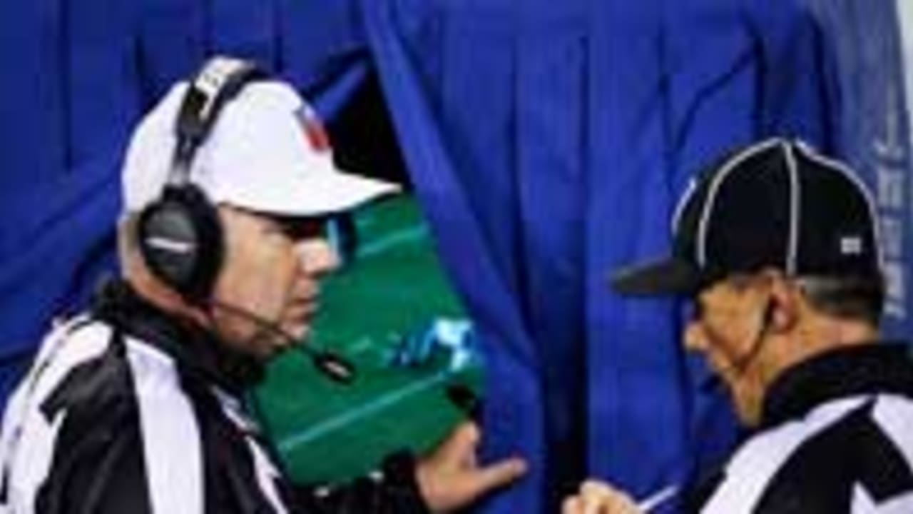 Officials-Looking-at-Replay-SL-150328