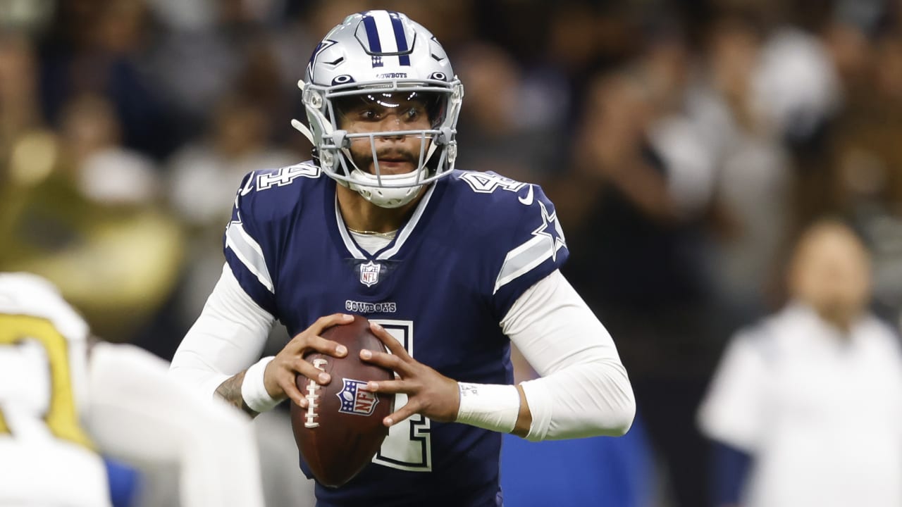 Dallas Cowboys quarterback Dak Prescott rainbows 32-yard pass to wide  receiver CeeDee Lamb along sideline