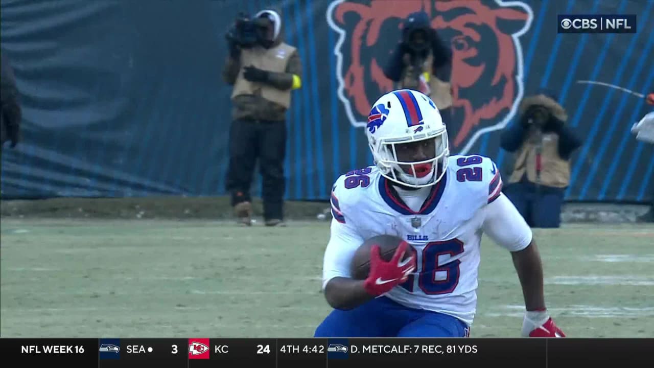 Buffalo Bills running back Devin Singletary (26) runs with the ball during  the first half of an NFL football game against the Pittsburgh Steelers in  Orchard Park, N.Y., Sunday, Oct. 9, 2022. (