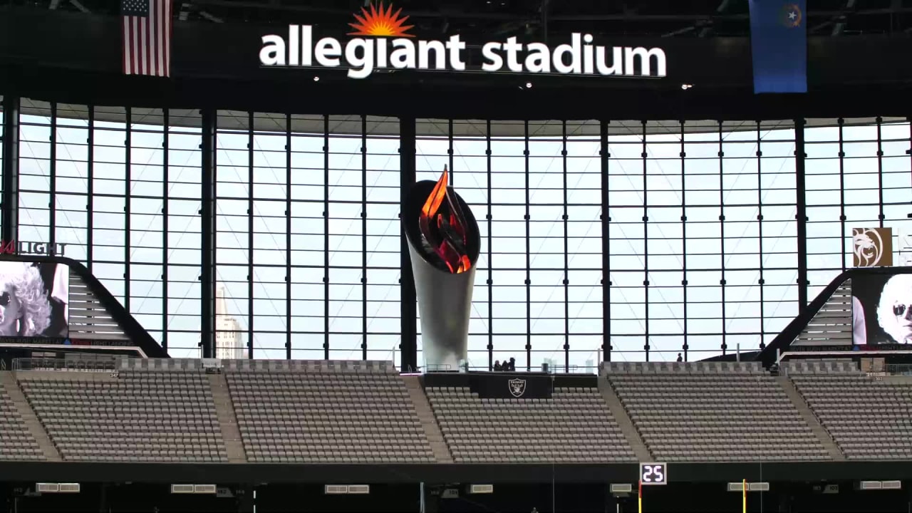 Carol Davis lights torch inside Allegiant Stadium for the first time