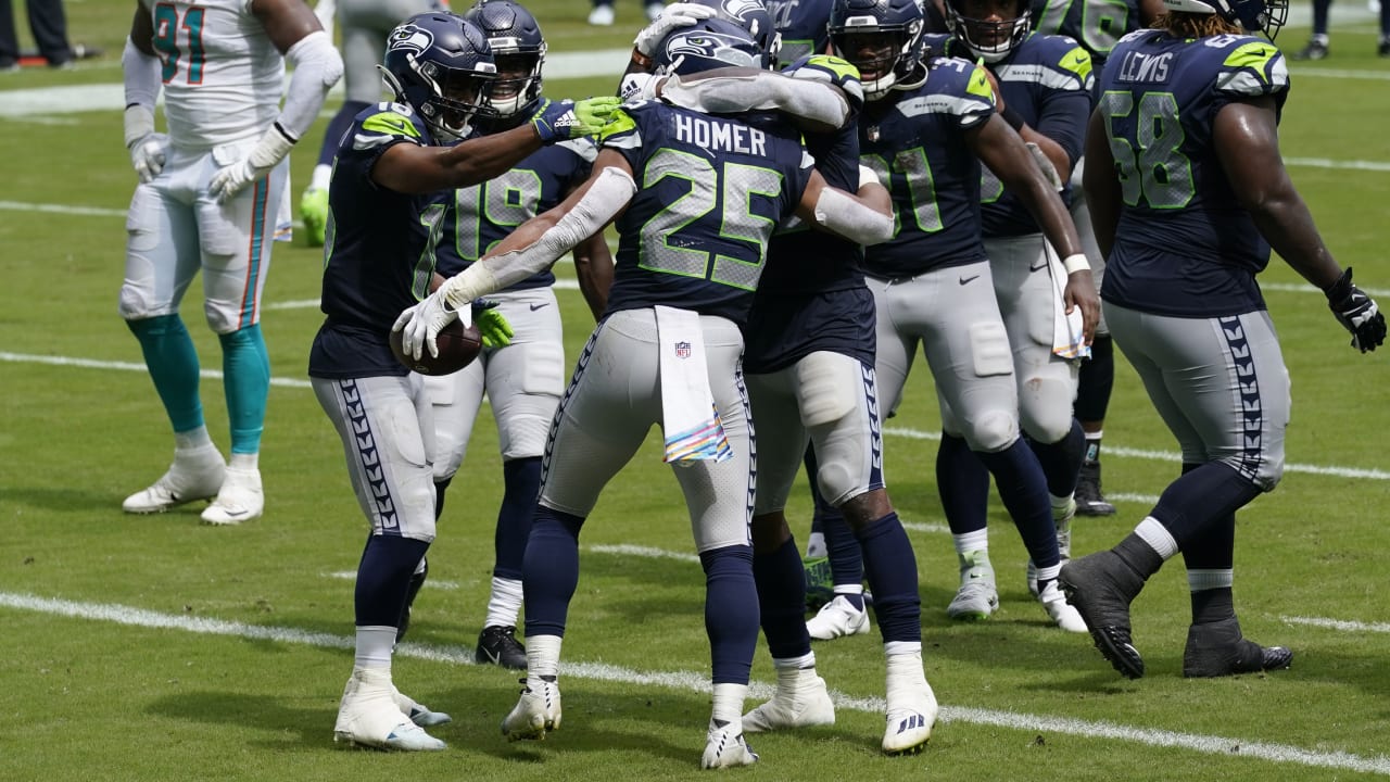 Seattle Seahawks running back Travis Homer is pictured before an