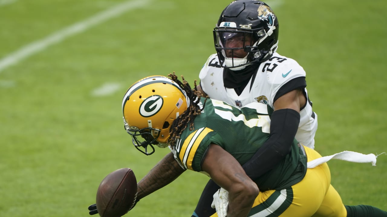 Jacksonville Jaguars cornerback C.J. Henderson jars ball free from