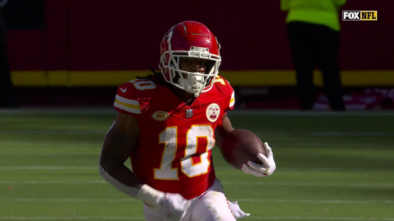 Kansas City Chiefs running back Isiah Pacheco bulldozes and spins off a  defender for an 11-yard gain