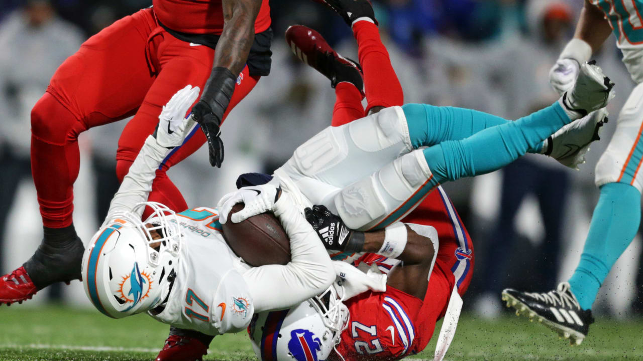 Miami Dolphins wide receiver Jaylen Waddle (17) kneels on the field before  the start of an NFL football game against the Atlanta Falcons, Sunday Oct  24, 2021, in Miami Gardens, Fla. (AP