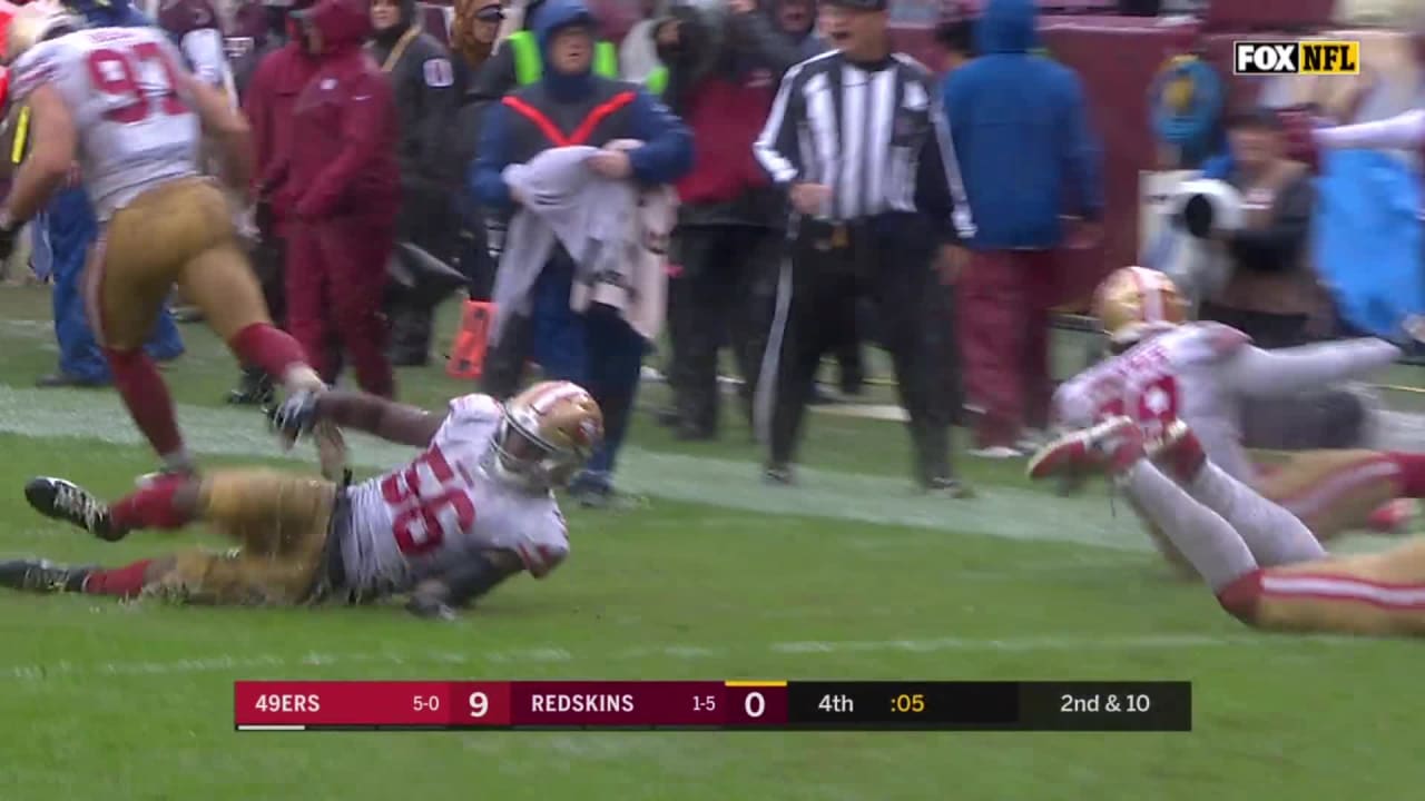 NFL photos: 49ers vs. Redskins, a muddy face and a Nick Bosa slide