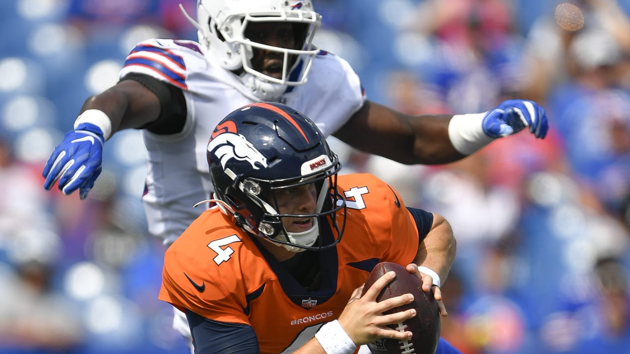 Buffalo Bills defensive linemand Eli Ankou engulfs Rypien for