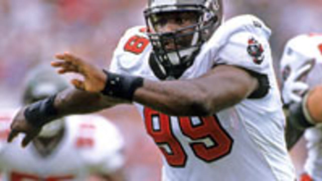 Former Tampa Bay Buccaneers defensive lineman Warren Sapp watches