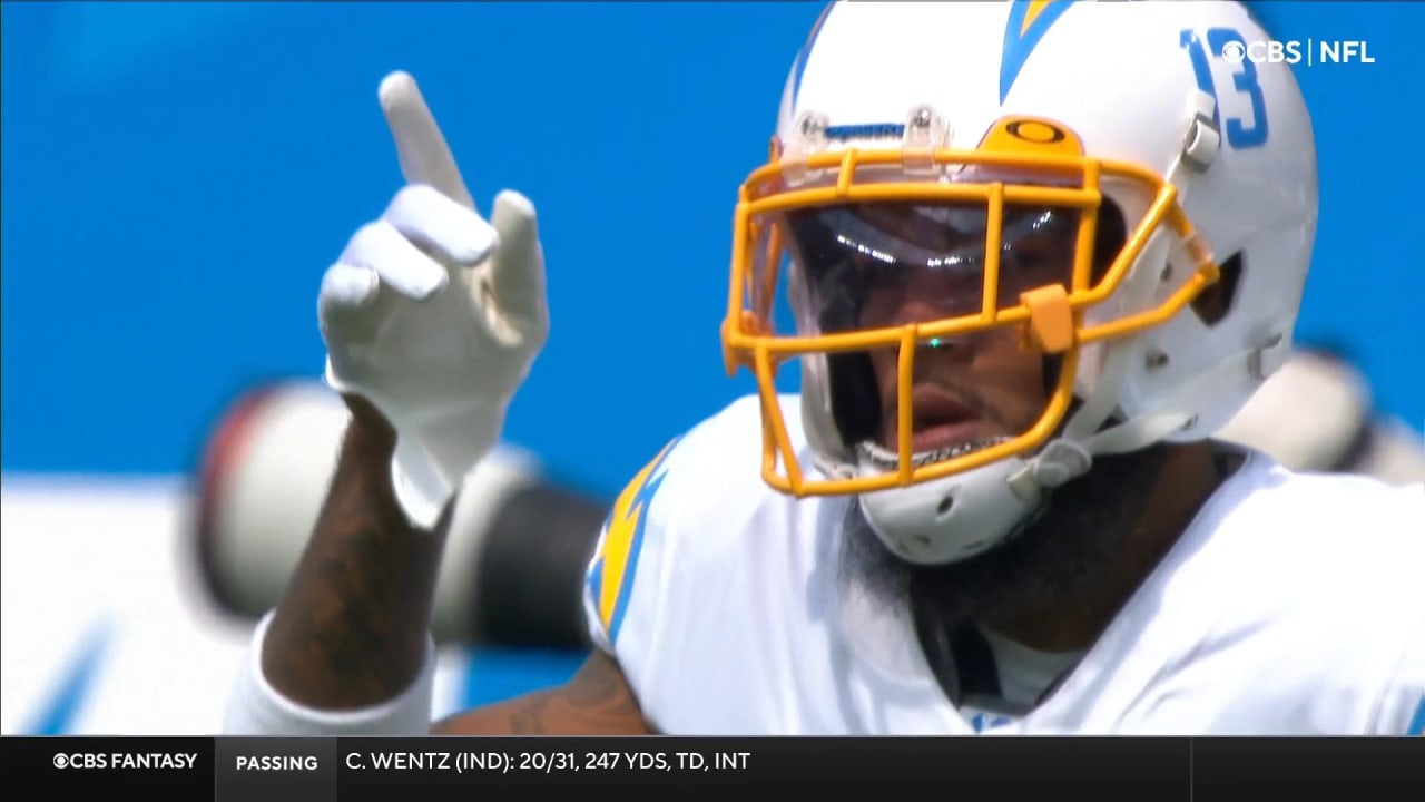 Los Angeles Chargers quarterback Justin Herbert's scrambling laser ends in  wide receiver Keenan Allen's sideline toe-tap grab