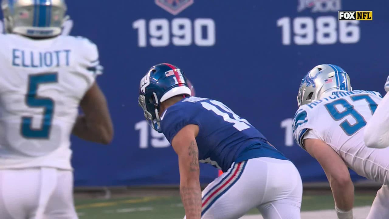 Detroit Lions defensive back Will Harris ajars ball from Hodgins, defensive  end Aidan Hutchinson recovers fumble