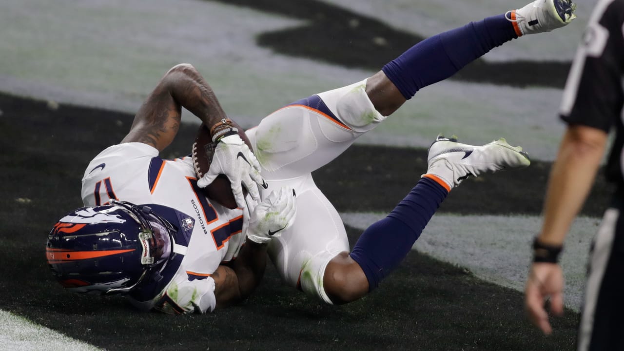 Denver Broncos wide receiver DaeSean Hamilton, left, celebrates his  touchdown against the Detro …