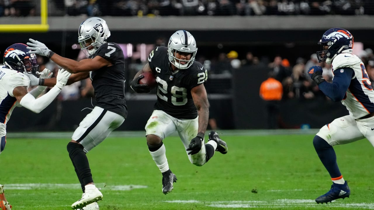 Oakland Raiders running back Josh Jacobs runs the ball during an NFL  football game against the Denver Broncos on Monday, Sept. 9, 2019, in  Oakland, CA. The Raiders won 24-16. (Daniel Gluskoter/AP