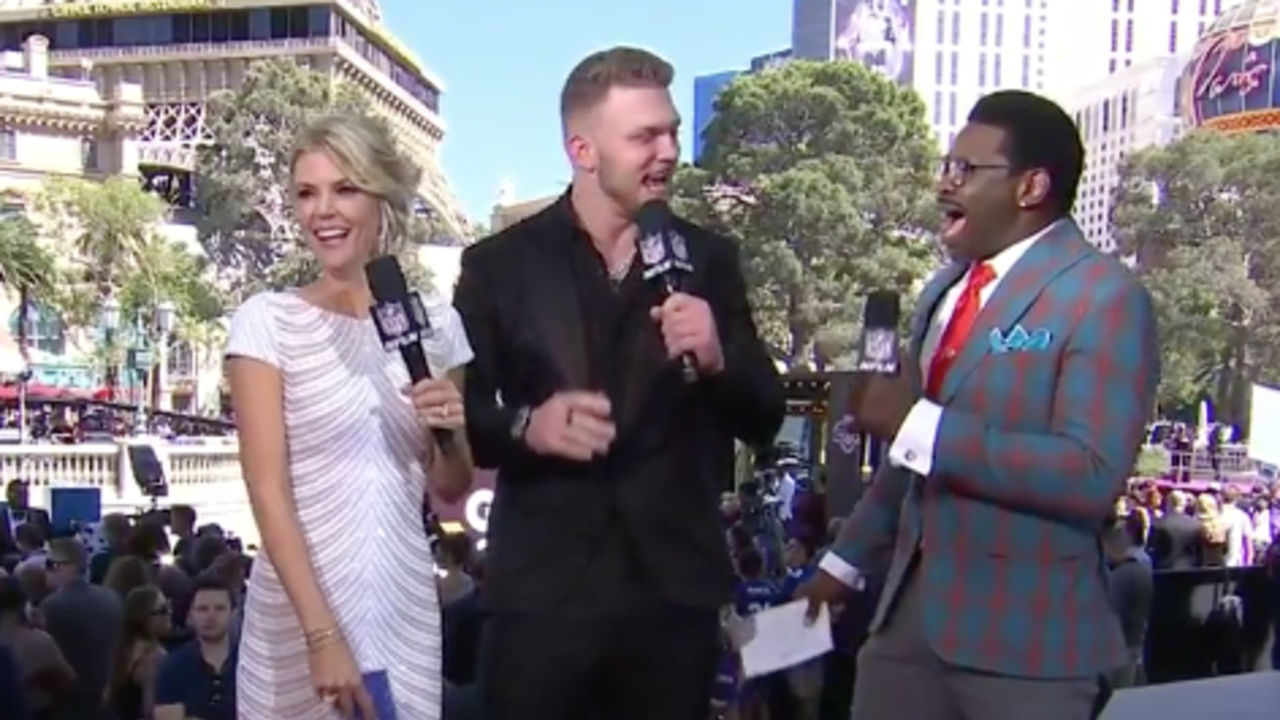 EDGE prospect Aidan Hutchinson explains his draft outfit to NFL Media's Michael  Irvin, Melissa Stark