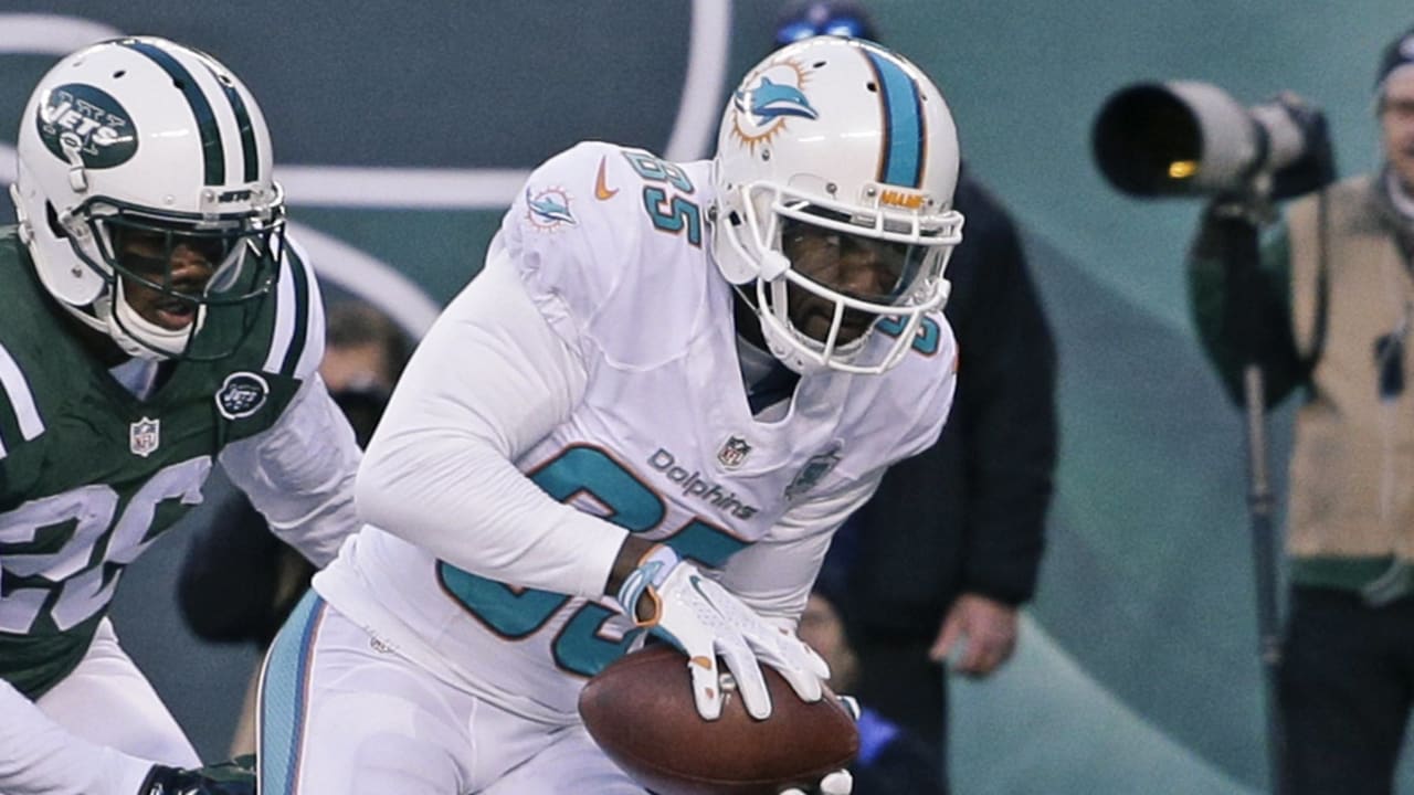 Dolphins restructure Suh, Misi; cut Jennings 