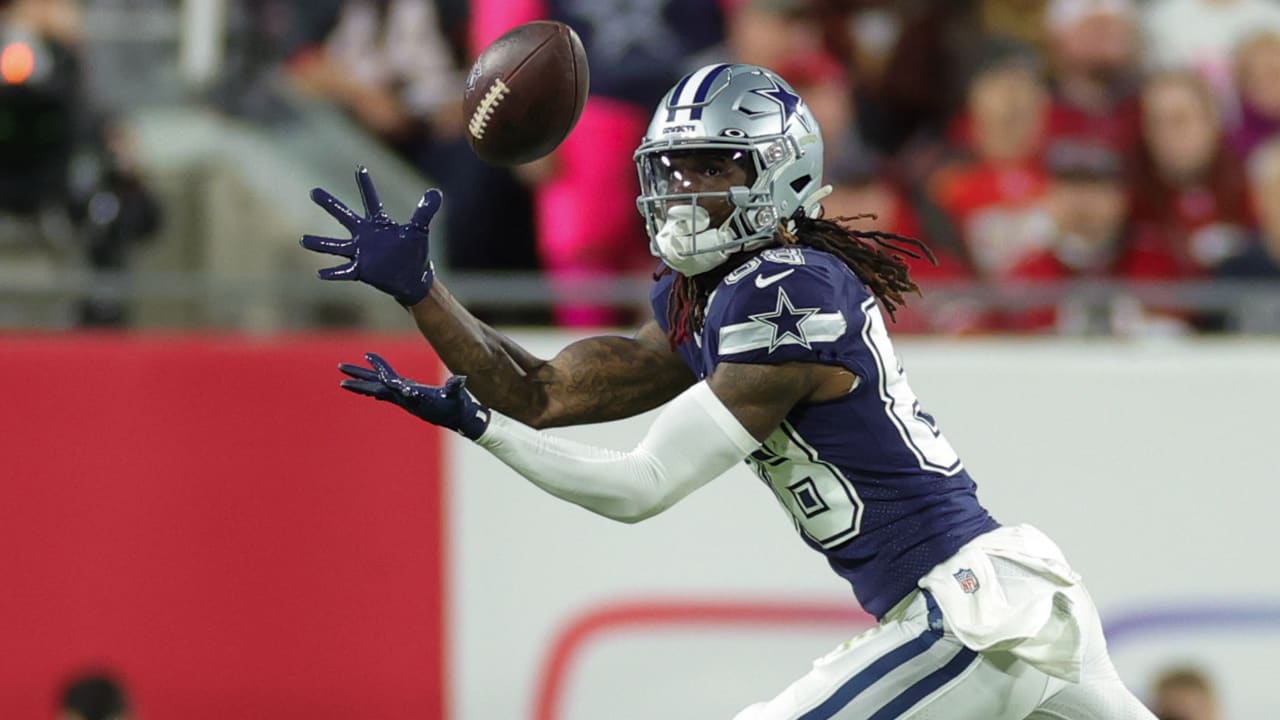 Dallas Cowboys quarterback Dak Prescott rainbows 32-yard pass to wide  receiver CeeDee Lamb along sideline