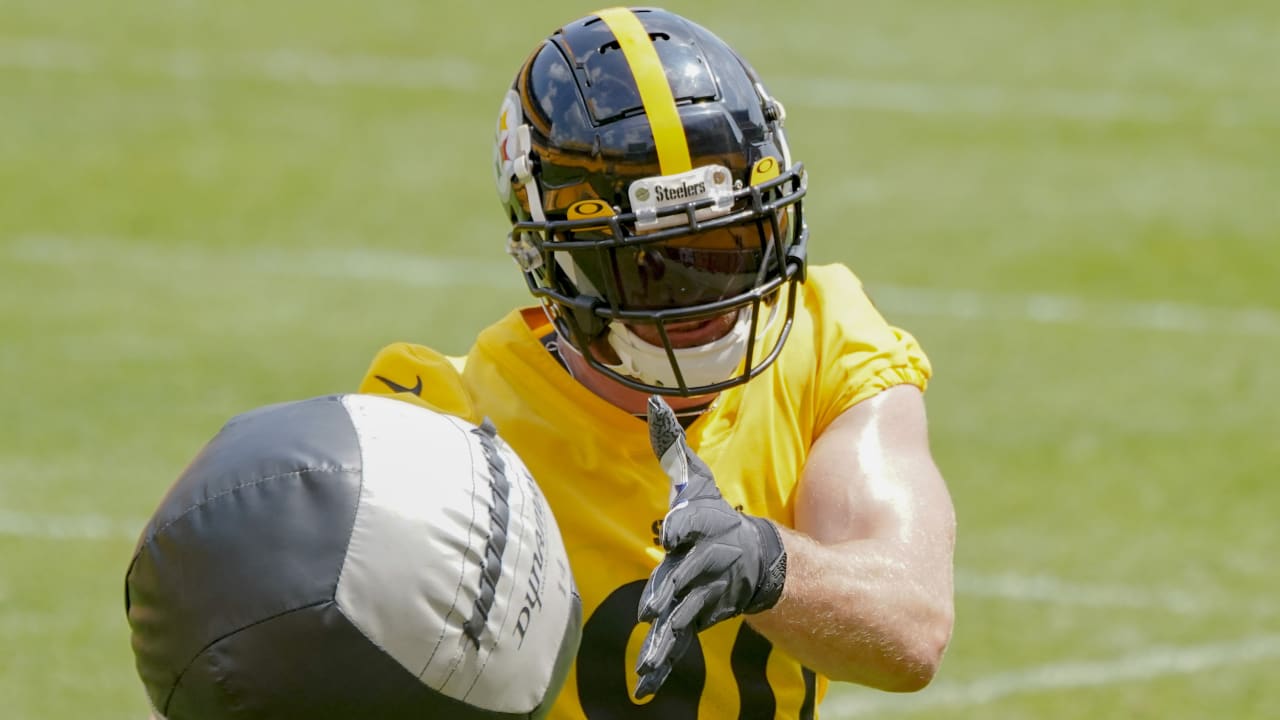 Check out Steelers LB T.J. Watt as he signs a baby at training camp