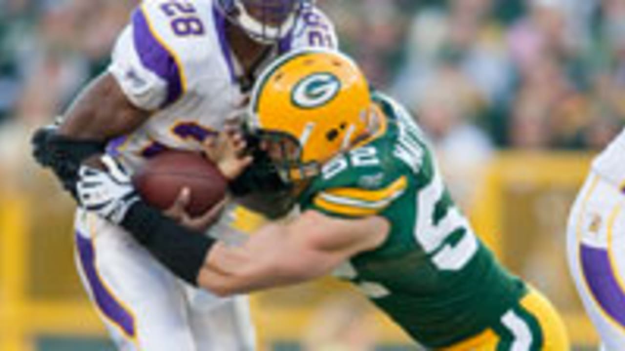 adrian-peterson-clay-matthews-130103-spot.jpg