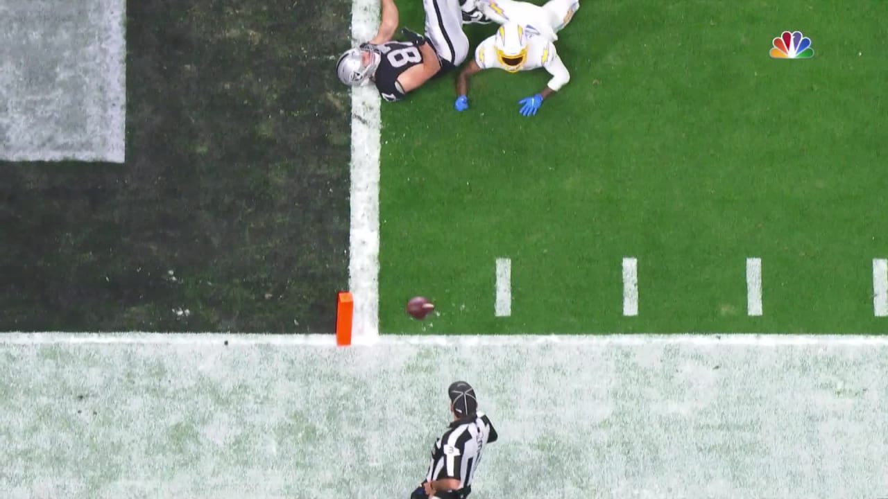 Raiders tight end Foster Moreau (87) prepares to spike the football after  scoring a touchdown d …