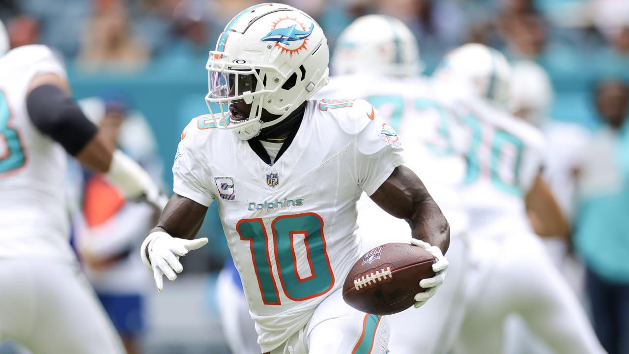 Tyreek snags game-winner as Dolphins outlast Chargers. See photos