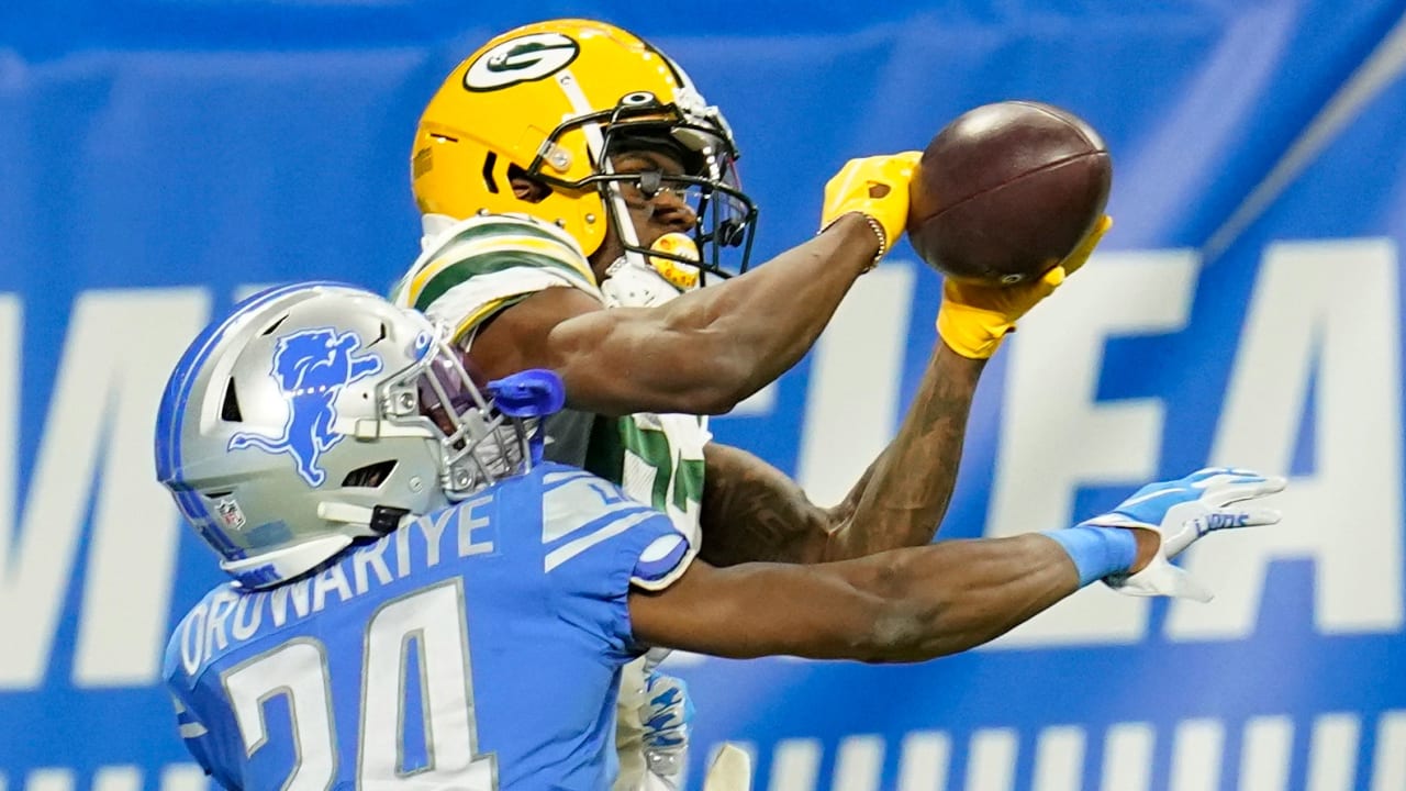 November 11, 2018: Green Bay Packers wide receiver Marquez Valdes-Scantling  #83 stiff arms Miami Dolphins cornerback Bobby McCain #28 during the NFL  Football game between the Miami Dolphins and the Green Bay