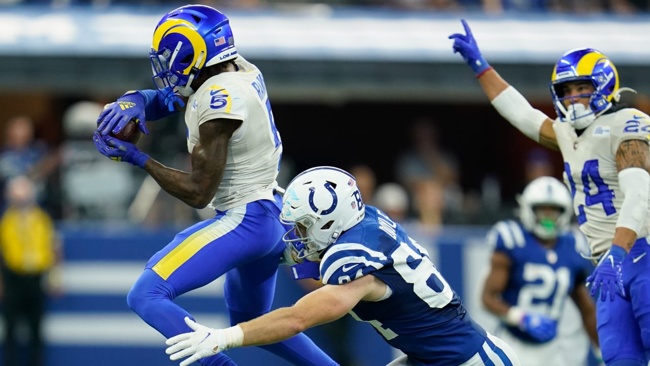 Los Angeles Rams' Jalen Ramsey (5) holds his daughter as he leaves the  field following an NFL football game against the Indianapolis Colts,  Sunday, Sept. 19, 2021, in Indianapolis. (AP Photo/Michael Conroy