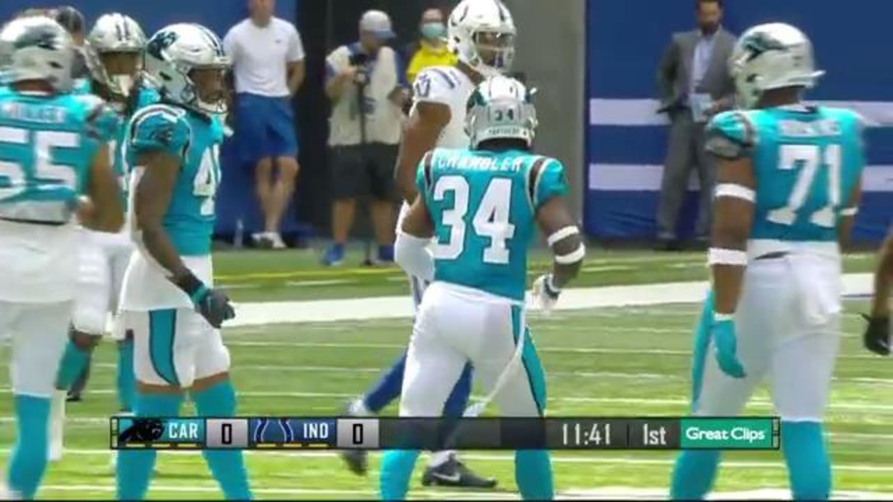 Carolina Panthers safety Sean Chandler, left, tackles New England