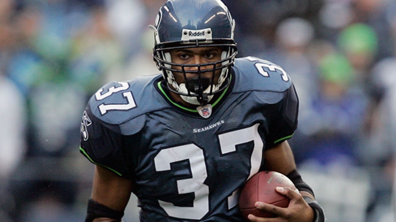 Seattle Seahawks running back Shaun Alexander (37) breaks through