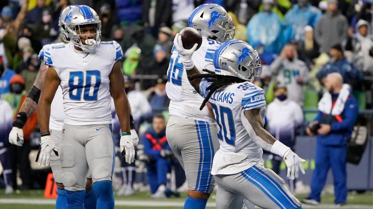 Detroit Lions running back Jamaal Williams lasers a fastball toward the ...