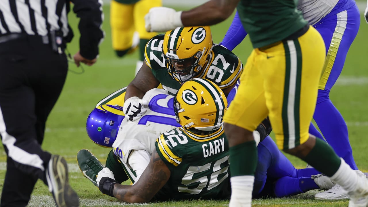 Green Bay Packers defenders Rashan Gary and Kenny Clark take down Los Angeles Rams quarterback Jared Goff for a clutch fourth-down sack