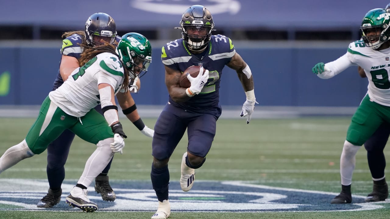 Seattle Seahawks running back Chris Carson looks shot out of a cannon