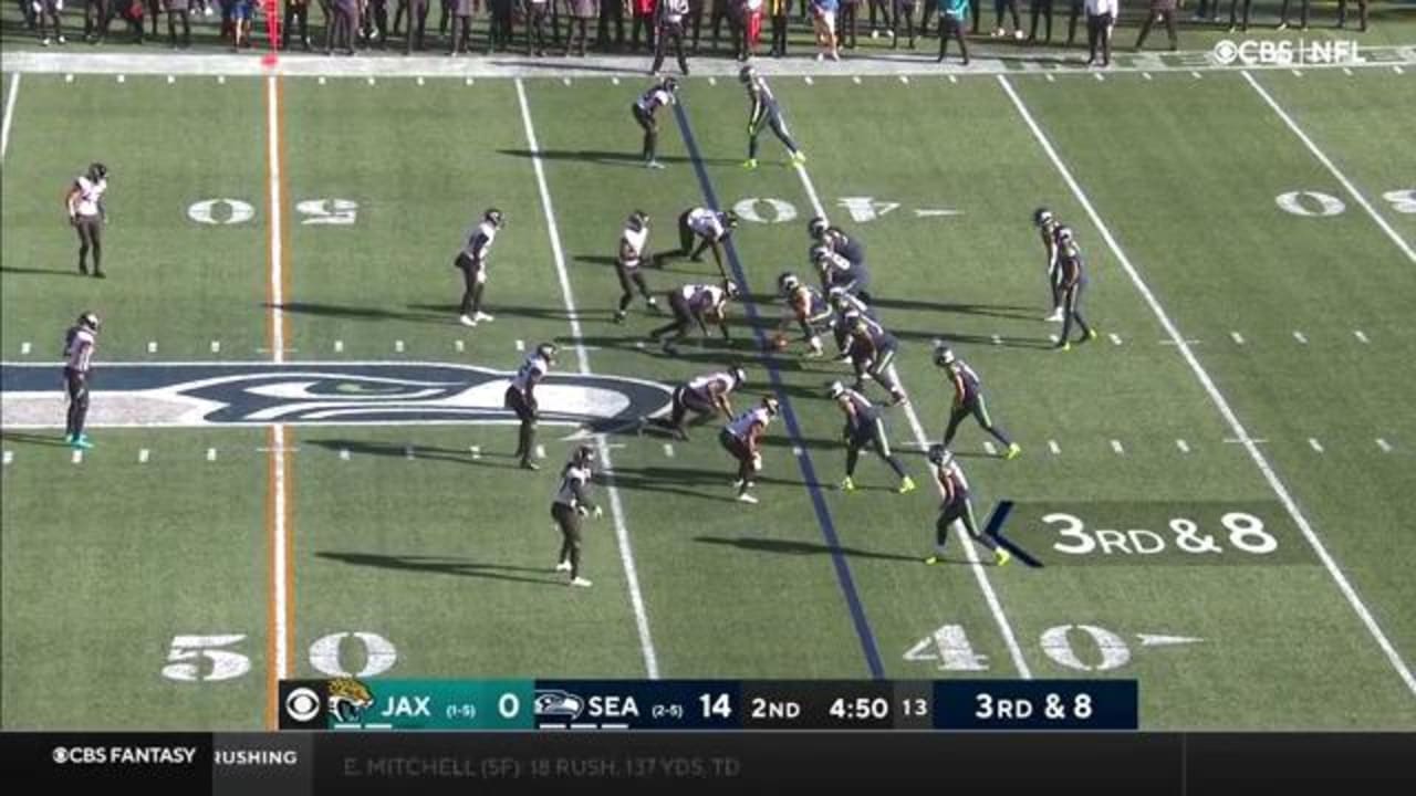 Seattle Seahawks quarterback Geno Smith's sideline delivery hits