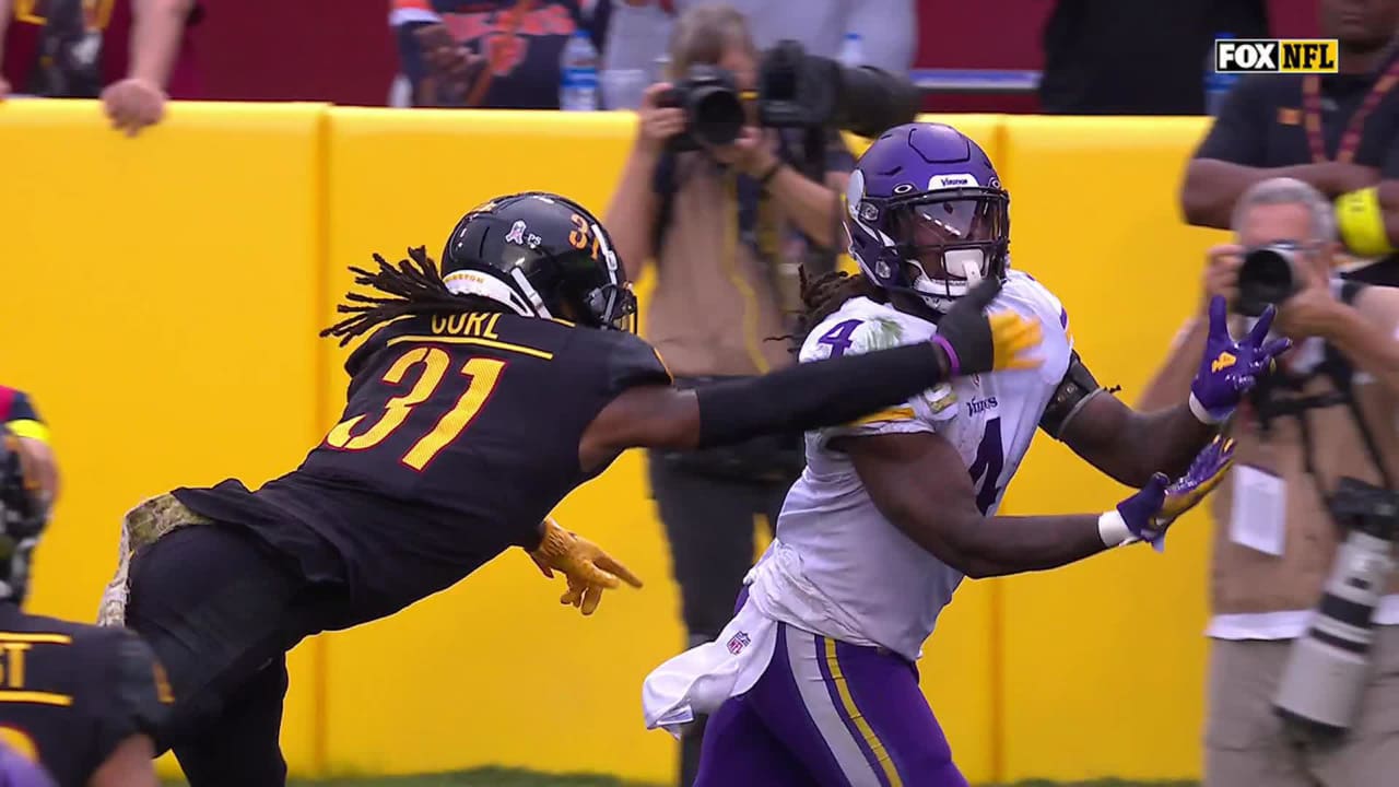 Minnesota Vikings quarterback Kirk Cousins, right, hands off to running  back Dalvin Cook (4) in the second half of an NFL football game against the  Buffalo Bills, Sunday, Nov. 13, 2022, in