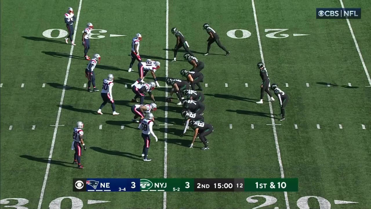 New York Jets wide receiver Garrett Wilson zooms across line of