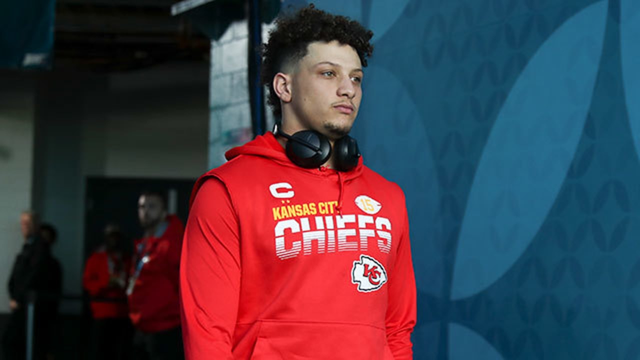 Kansas City Chiefs Patrick Mahomes and Len Dawson walk signatures