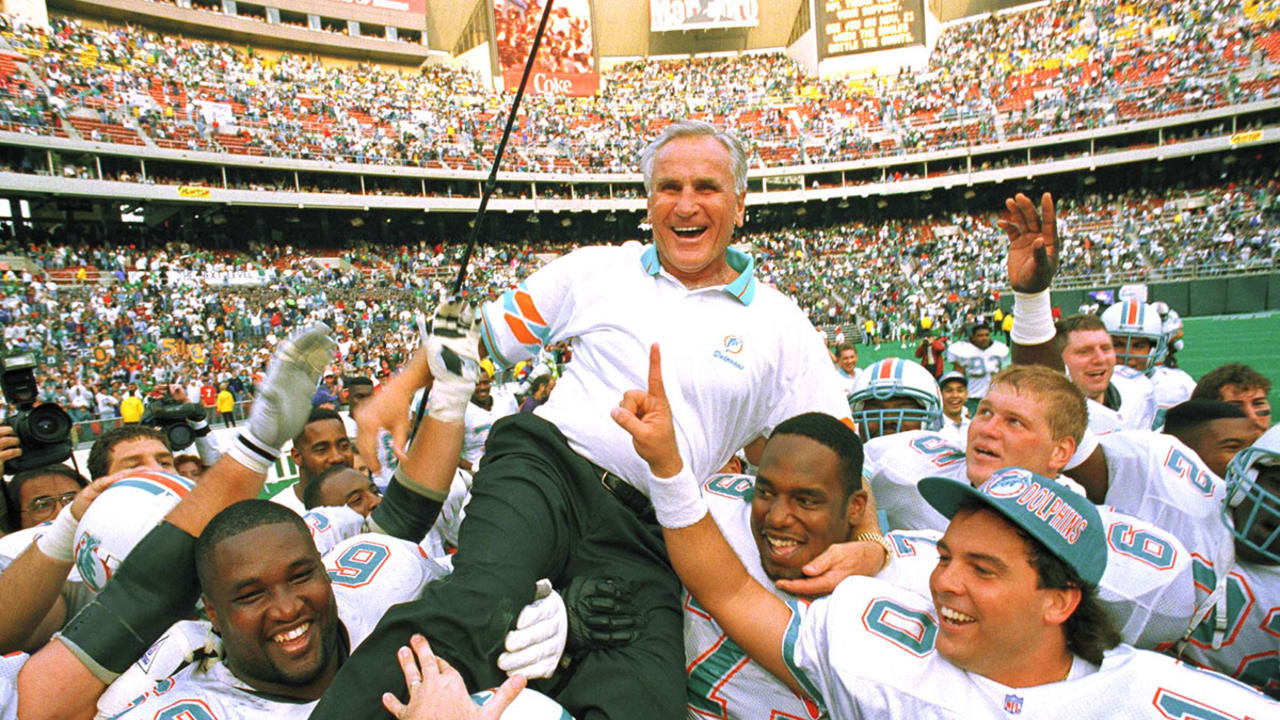 Former Miami Dolphins head coach Don Shula celebrates with