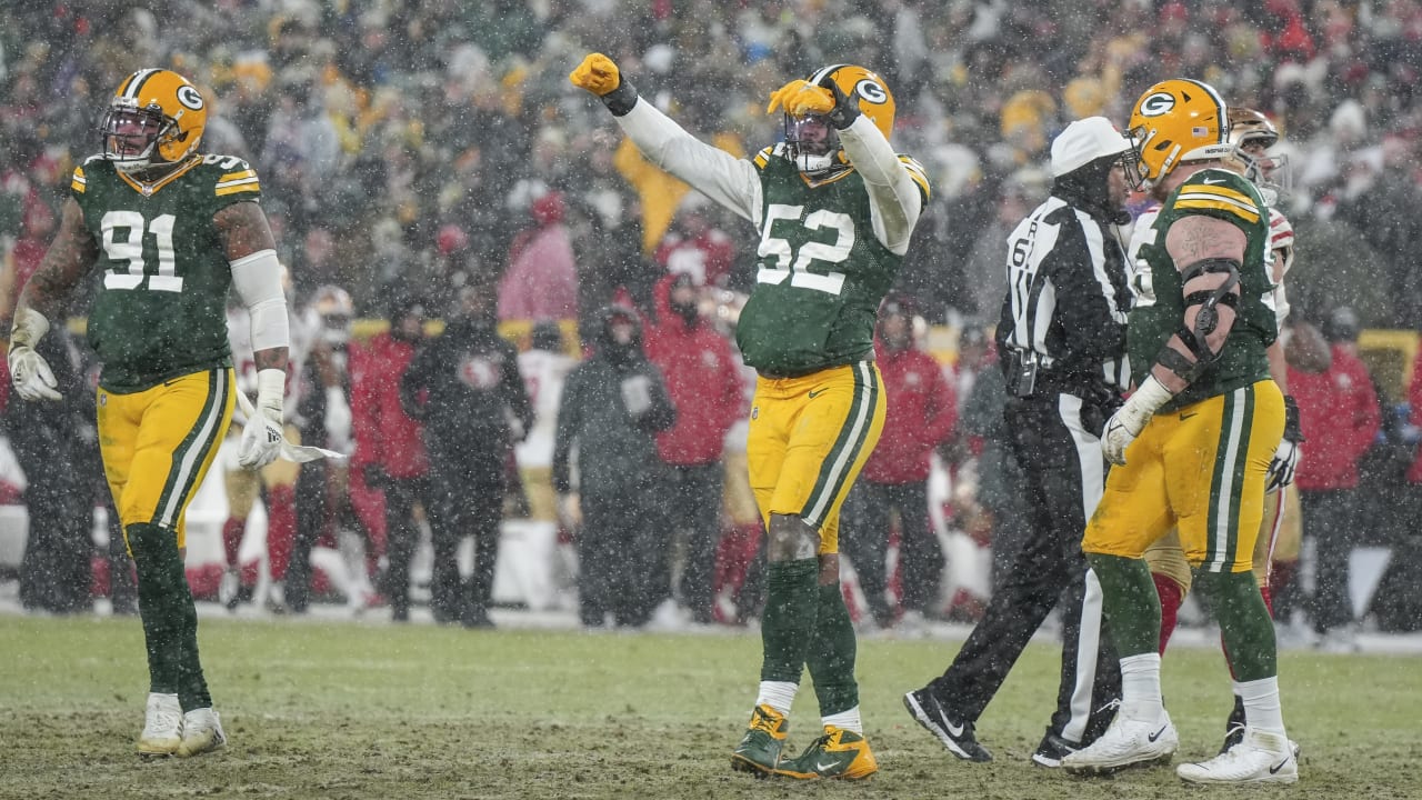 Green Bay Packers linebacker Rashan Gary (52) rushes during an NFL