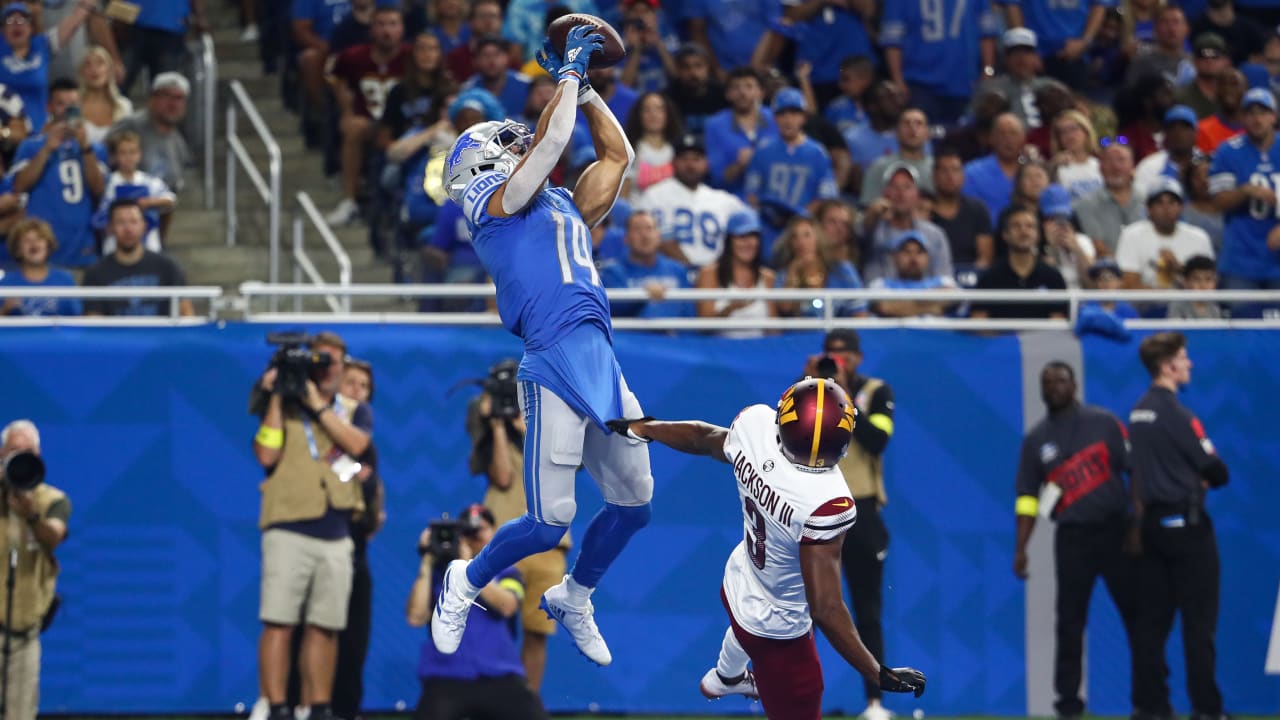 Detroit Lions wide receiver Amon-Ra St. Brown reacts after his 1-yard  reception for a touchdown during the first half of an NFL football game  against the Buffalo Bills, Thursday, Nov. 24, 2022