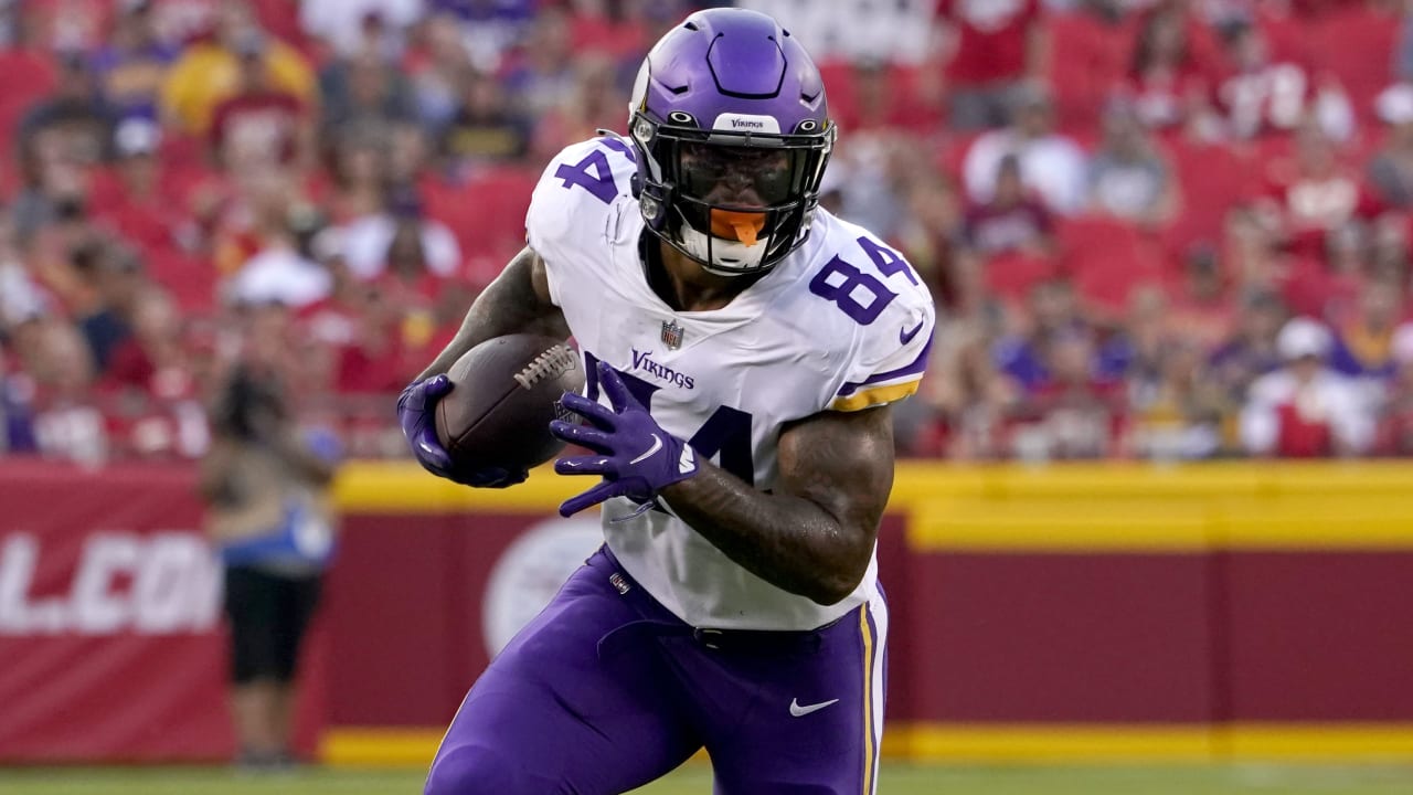 Minnesota Vikings tight end Irv Smith Jr. drags a Kansas City Chiefs  defensive back with him on a 23-yard catch and run