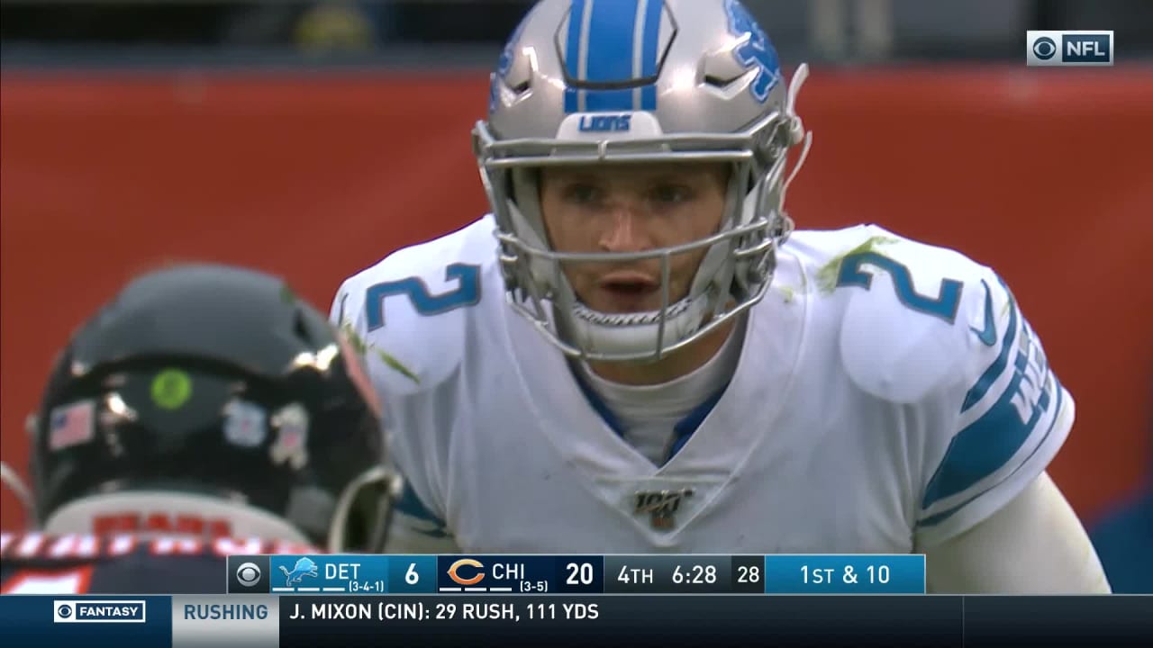 Detroit Lions quarterback Jeff Driskel (2) slides after a run as