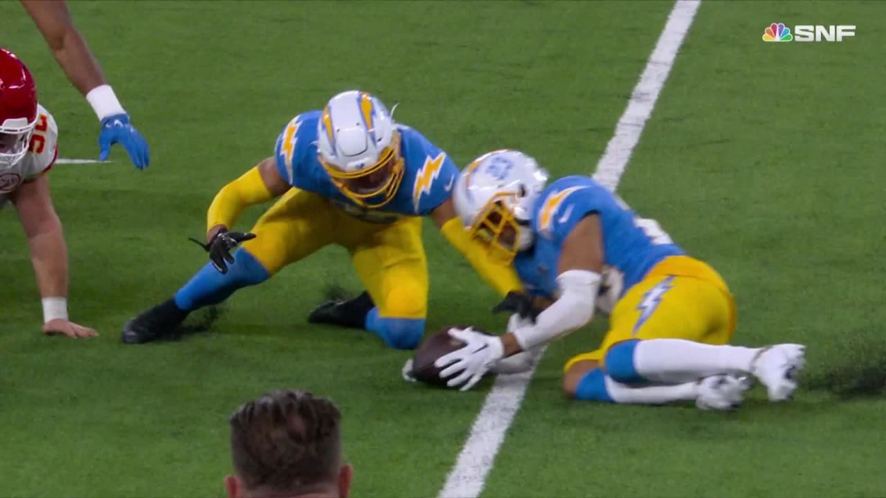 Los Angeles Chargers linebacker Troy Reeder dislodges the ball from Kansas  City Chiefs running back Jerrick McKinnon's clutches to give the Chargers a  crucial takeaway