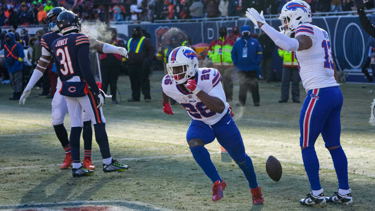 Buffalo Bills running back Devin Singletary (26) runs with the ball during  the first half of an NFL football game against the Pittsburgh Steelers in  Orchard Park, N.Y., Sunday, Oct. 9, 2022. (