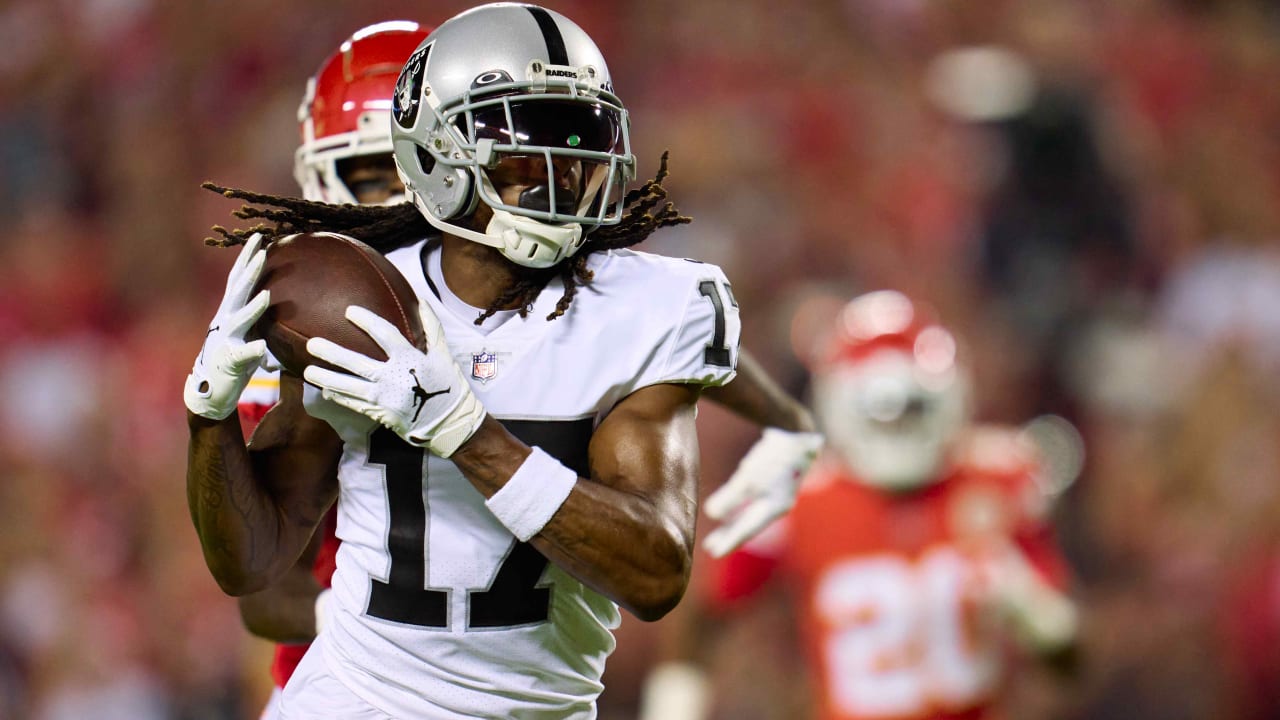 Las Vegas Raiders wide receiver Davante Adams (17) attempts to catch a pass  against the Kansas City Chiefs in an NFL football game, Saturday, Jan. 7,  2023, in Las Vegas, NV. Chiefs