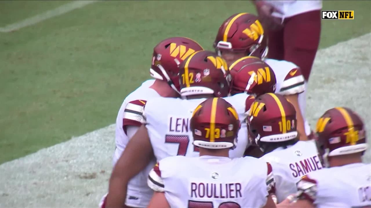 Washington Commanders wide receiver Jahan Dotson hauls in quarterback