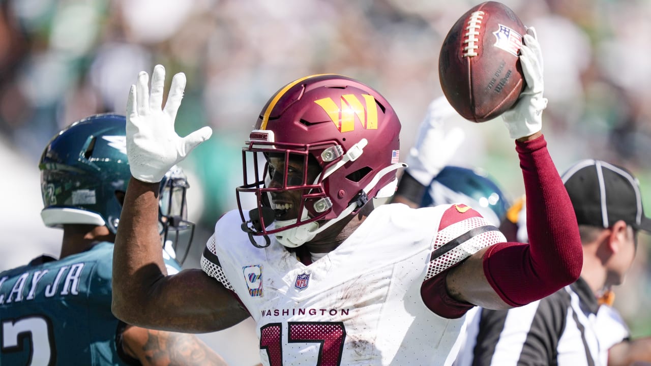 Washington Commanders wide receiver Terry McLaurin scores TD after running  back Brian Robinson's fumble via truck stick at goal line